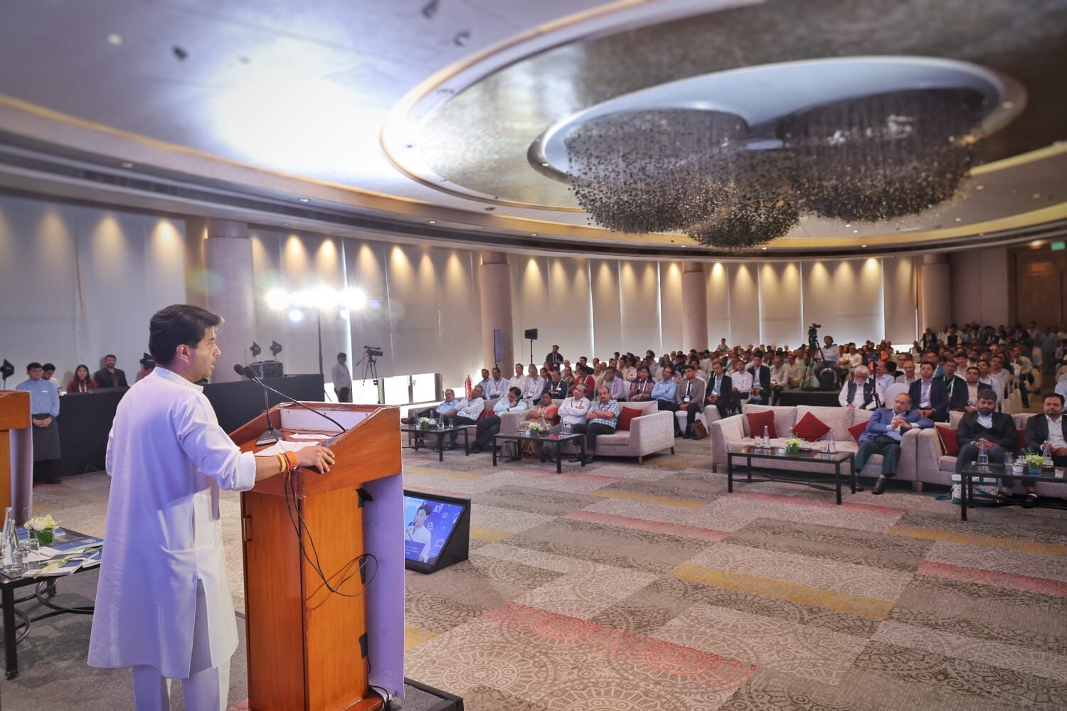 Hon'ble Union Minister of Communications Shri Jyotiraditya M. Scindia delivering the valedictory address at the TSDSI Tech Deep Dive 2026 conference, speaking from the podium to a full hall of delegates.